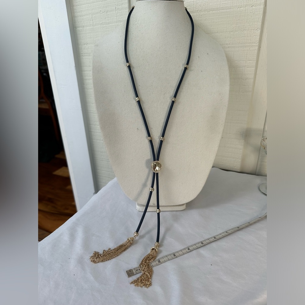Long lariat style navy leather and goldtone WHBM necklace